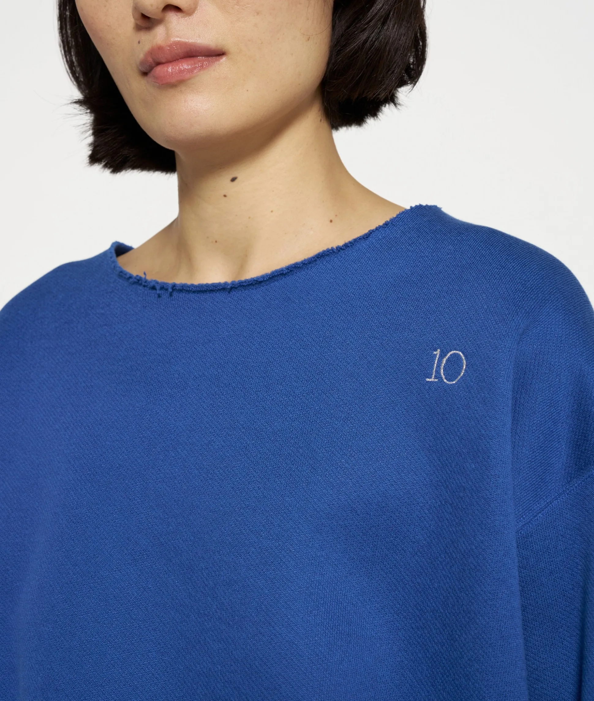 Raw Edge Statement Sweater