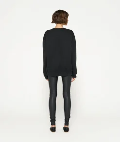 THE STATEMENT SWEATER