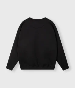 THE STATEMENT SWEATER