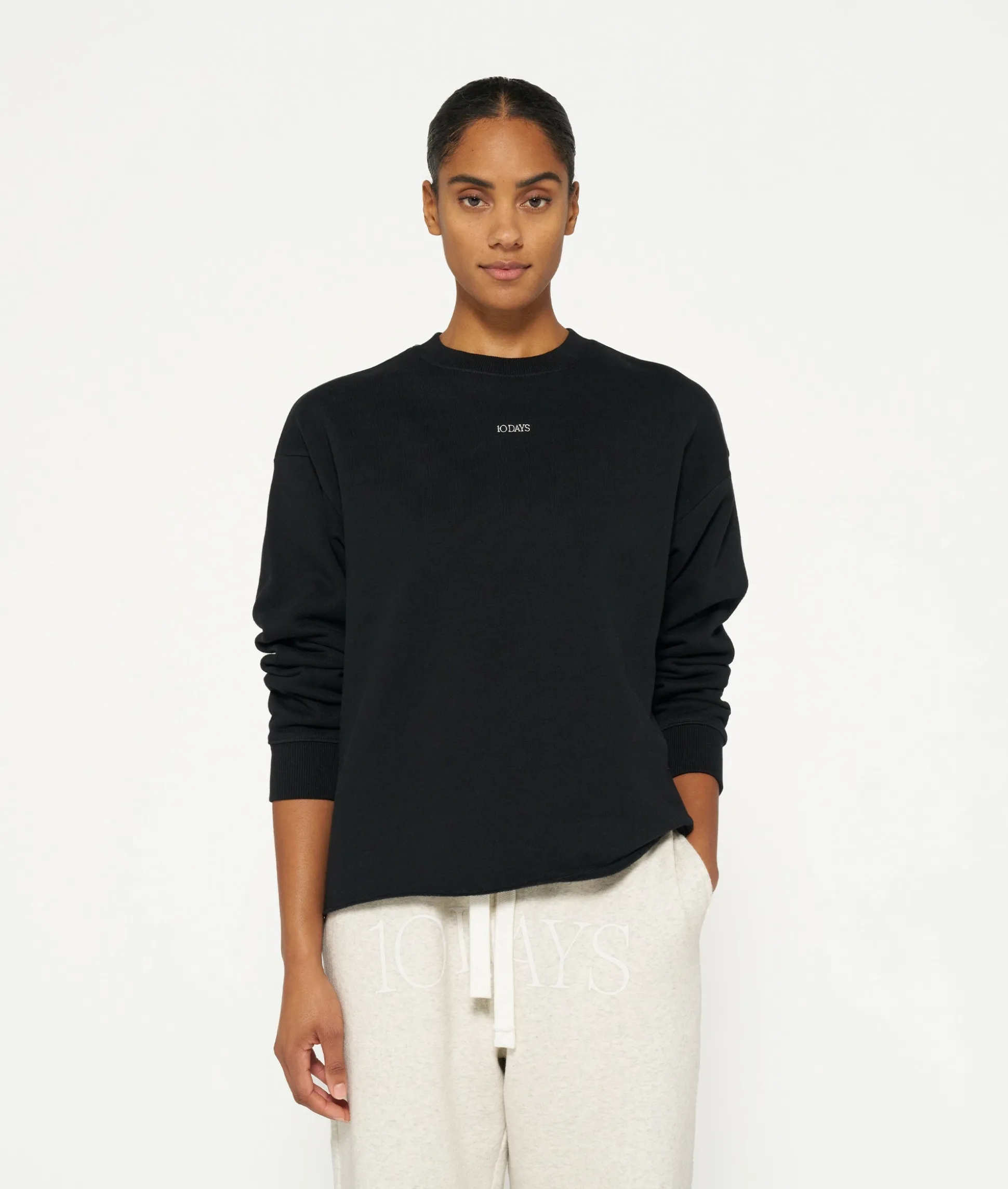 THE SWEATER LOGO
